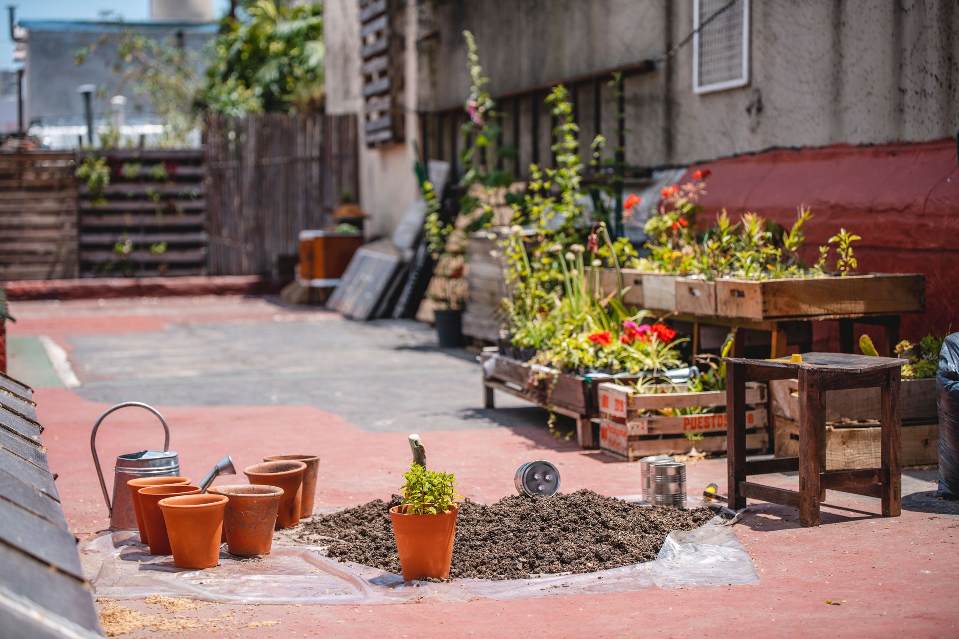 Soil and Pots Ready for Planting in Sunny Roof Garden